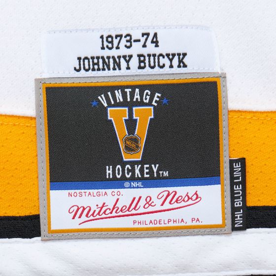 Mitchell & Ness: Johnny Bucyk Boston Bruins Jersey (White/Black/Yellow)